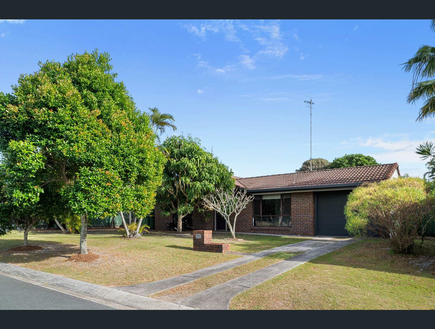 The original brick house at Sunrise Beach, bought in 2020